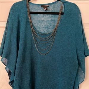 Linen turquoise top with open sleeves.